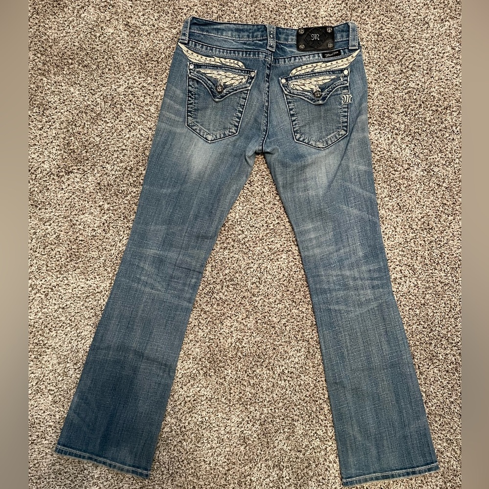 Miss Me Jeans Size 29 Boot Cut. White leather jewel embellished.
